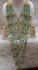 ✨ Product Highlights: • Premium artificial jewelry with elegant gold finish • Multi-layered design with high-quality mint green beads • Intricate handcrafted detailing for a luxurious look • Includes matching earrings for a complete set • Lightweight and comfortable for long wear