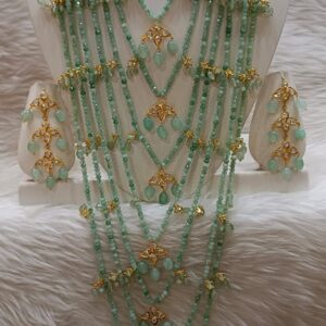 ✨ Product Highlights: • Premium artificial jewelry with elegant gold finish • Multi-layered design with high-quality mint green beads • Intricate handcrafted detailing for a luxurious look • Includes matching earrings for a complete set • Lightweight and comfortable for long wear